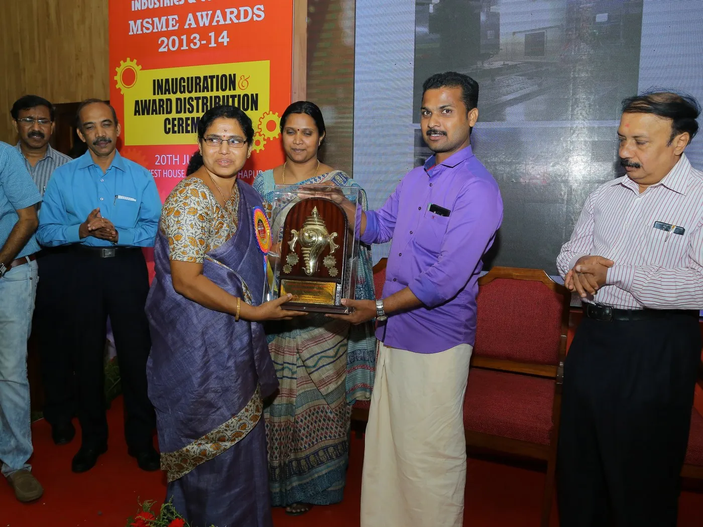 Receiving the MSME District Level Award, 2013–14